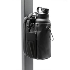 Black backpack with water bottle attachment on a white background